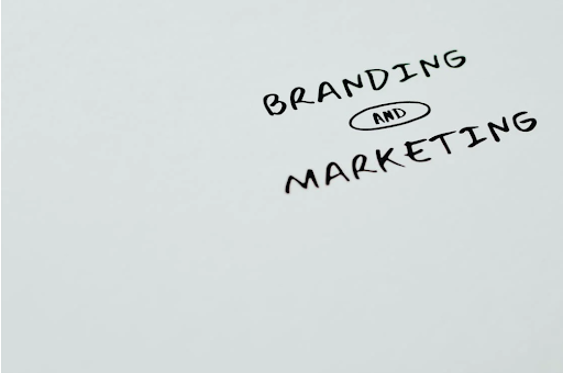 Branding and marketing written on a piece of paper